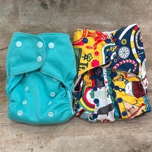 Lalabye Baby, one size cloth diapers reusable. Pair, one print one solid. *USED*